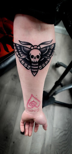 Explore tattoo ideas for lesbians, creative tattoo ideas in Kokomo, available at Pinpoint Piercing & Tattoo