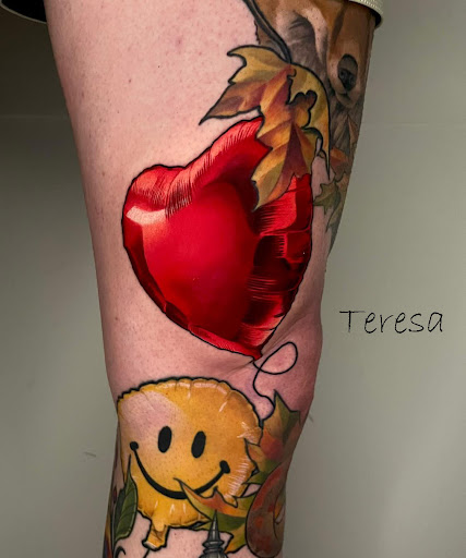 Explore tattoo ideas for women thigh, creative tattoo ideas in Sanford, available at Venom Ink Tattoo
