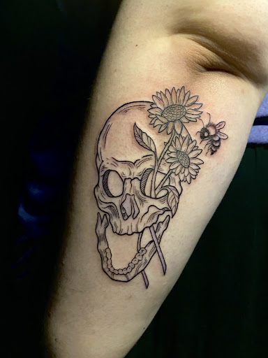 Explore last name tattoo ideas on arm, creative tattoo ideas in Chicago, available at Twisted Tattoo Studio