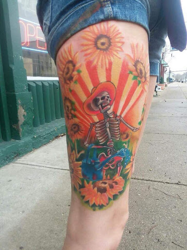 Explore neck tattoo ideas small, creative tattoo ideas in Eaton, available at Alley Cat Tattoos & Body