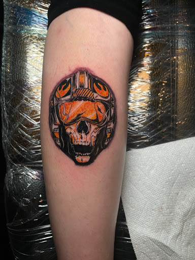 Explore lower leg tattoo ideas, creative tattoo ideas in Concord, available at Black Cloud Tattoo and Piercing