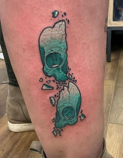 Explore black flower tattoo ideas, creative tattoo ideas in Mitchell, available at Raijin ink