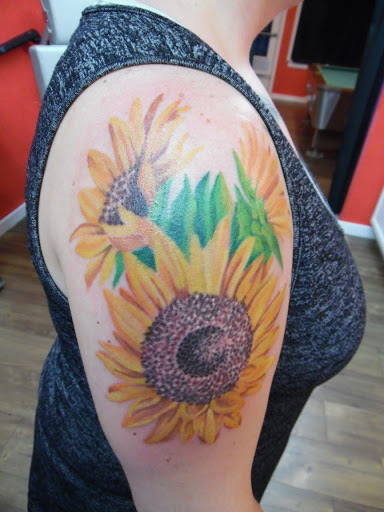 Explore hand skull tattoo ideas, creative tattoo ideas in Rapid City, available at Torch Lake Ink