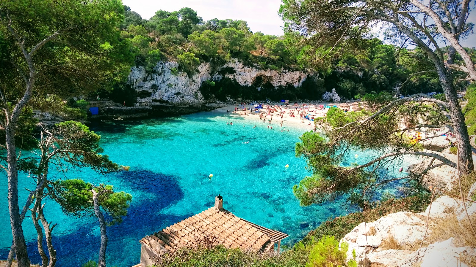 Photo of Cala Llombards beach with bright fine sand surface