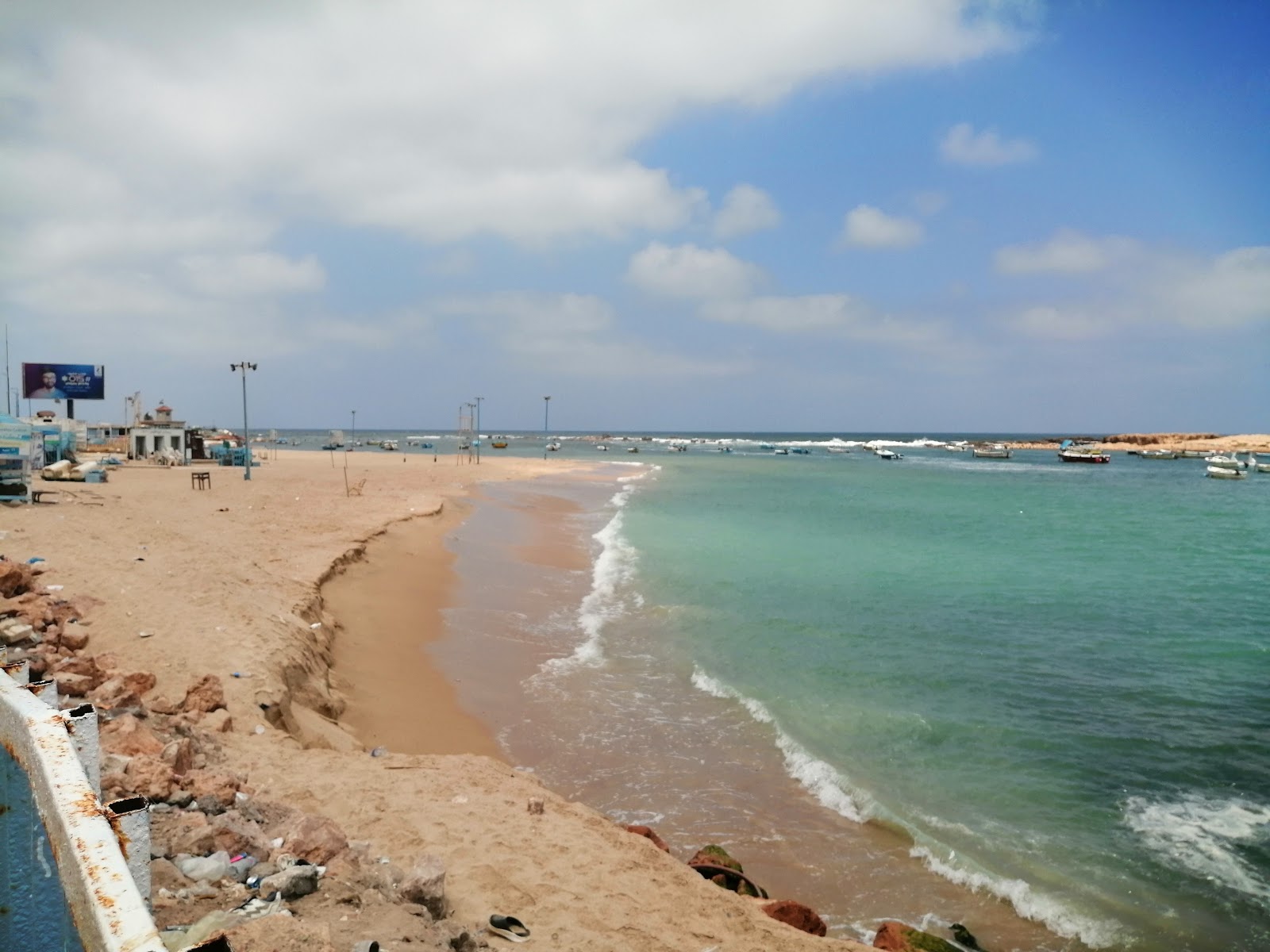 Φωτογραφία του Miamy Beach με φωτεινή άμμος επιφάνεια
