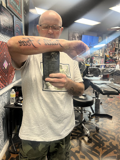 Explore solar eclipse tattoo ideas, creative tattoo ideas in Arlington, available at Urbans Tattoo & Piercing Studio