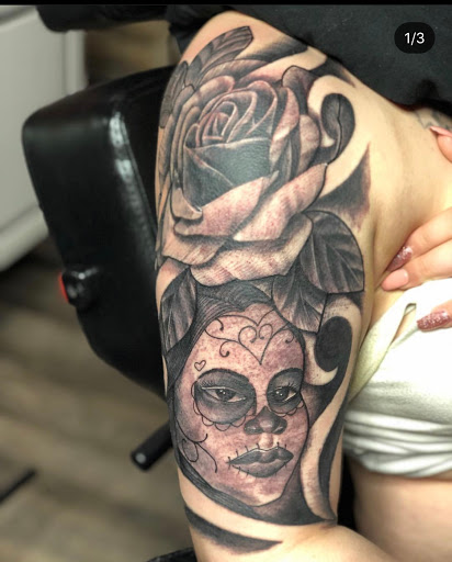 Find red indian tattoo ideas for your next unique tattoo in Saginaw at Tattoos By K-Rogg Tattoo Studio