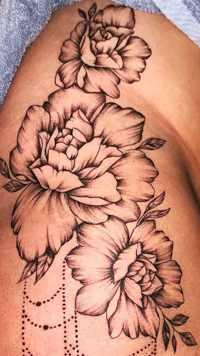 Explore live love laugh tattoo ideas, creative tattoo ideas in Boonville, available at UYS Under Your Skin Tattoos and Piercings