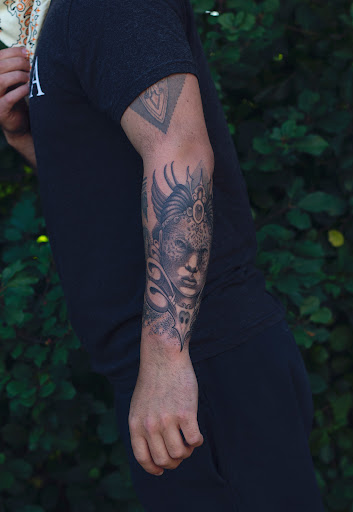 Explore tattoo ideas for son on mom, creative tattoo ideas in Hudson, available at The Bohemian Social Club