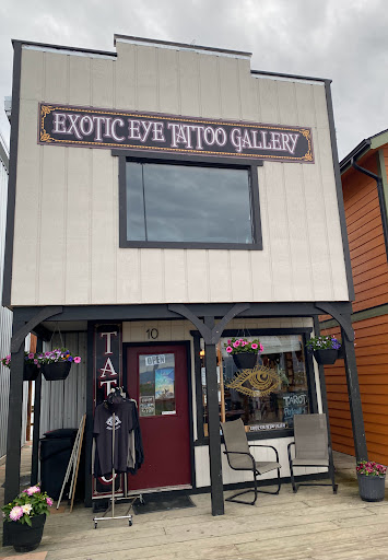 Explore memorial sleeve tattoo ideas, creative tattoo ideas in Homer, available at Exotic Eye Tattoo