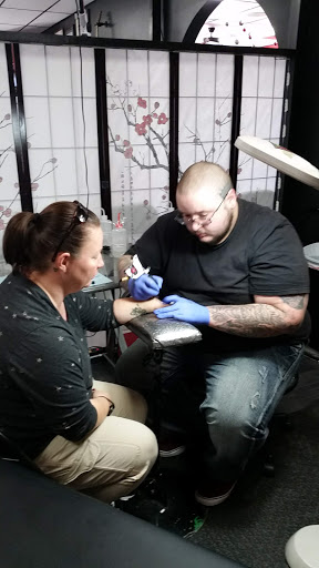 Explore salvadoran tattoo ideas, creative tattoo ideas in Fayetteville, available at Evolution Ink Tattoo and Piercing Studio