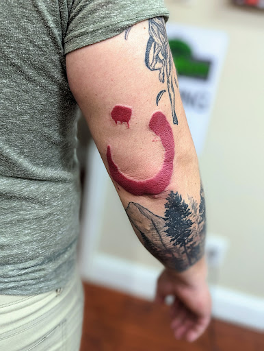 Explore rip neck tattoo ideas, creative tattoo ideas in Pittsburg, available at NeonMoon Tattoo