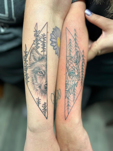 Explore cute spine tattoo ideas, creative tattoo ideas in Warner Robins, available at Untold Pain Tattoo Studio