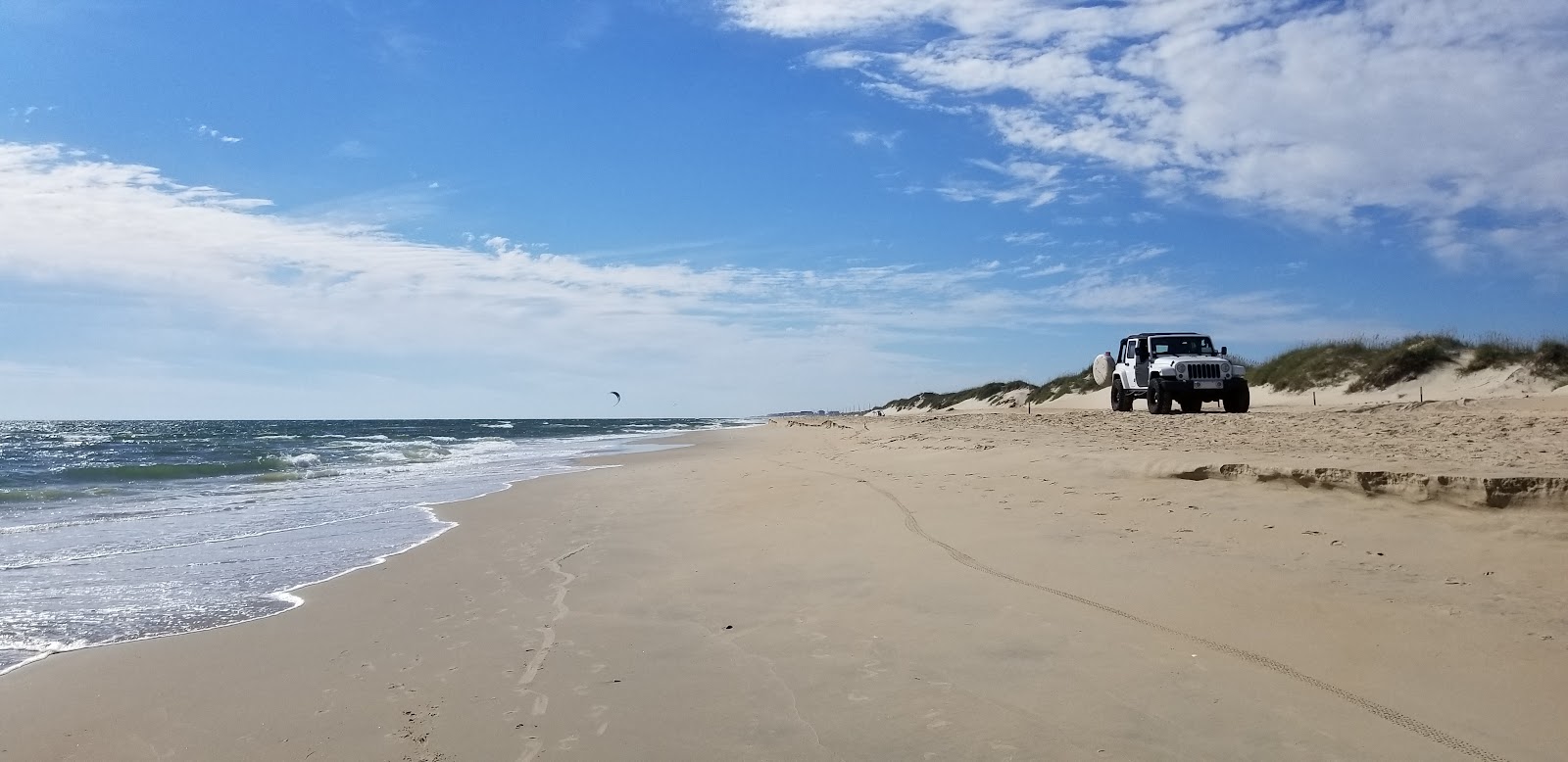 Photo de Frisco beach II avec sable lumineux de surface
