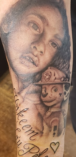 Explore finger print heart tattoo ideas, creative tattoo ideas in Lakewood, available at Aces and Eights Tattoo