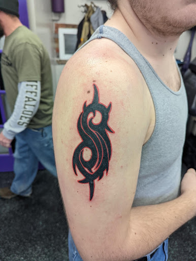 Explore mma tattoos ideas, creative tattoo ideas in Slippery Rock, available at Dinky Dachshund Tattoo Parlor