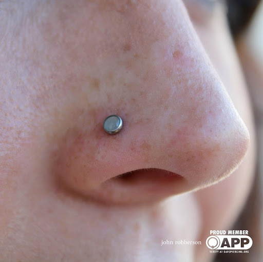 Explore religious chest tattoo ideas, creative tattoo ideas in Fort Myers, available at Tiger Lotus Tattoo and Piercing