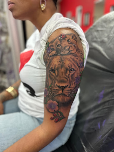 Explore neck tattoo ideas for females, creative tattoo ideas in Richmond, available at Captured Moment Tattoos