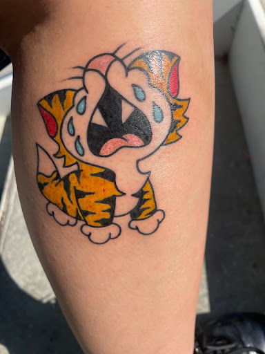 Explore stargazer lily tattoo ideas, creative tattoo ideas in Charleston, available at The Edge Tattoo Studio