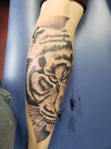 Explore awesome back tattoo ideas, creative tattoo ideas in Cincinnati, available at Bullseye Ink Tattoos & Piercing