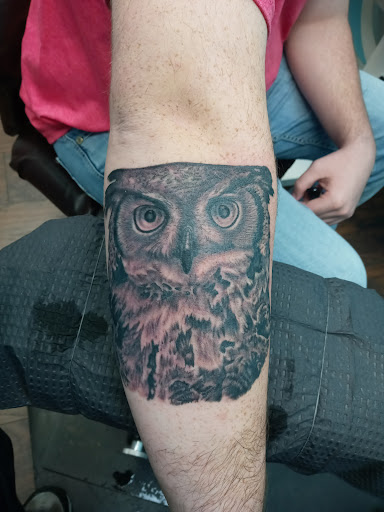 Explore rib tattoos for men ideas, creative tattoo ideas in Calhoun, available at Velvet Panther Tattoo and Piercing