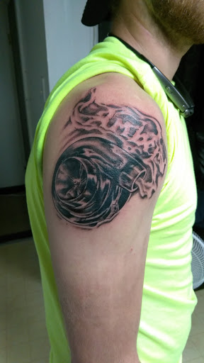 Explore forearm sleeve tattoo ideas for men, creative tattoo ideas in Bowling Green, available at Taboo Tattoos and Piercings