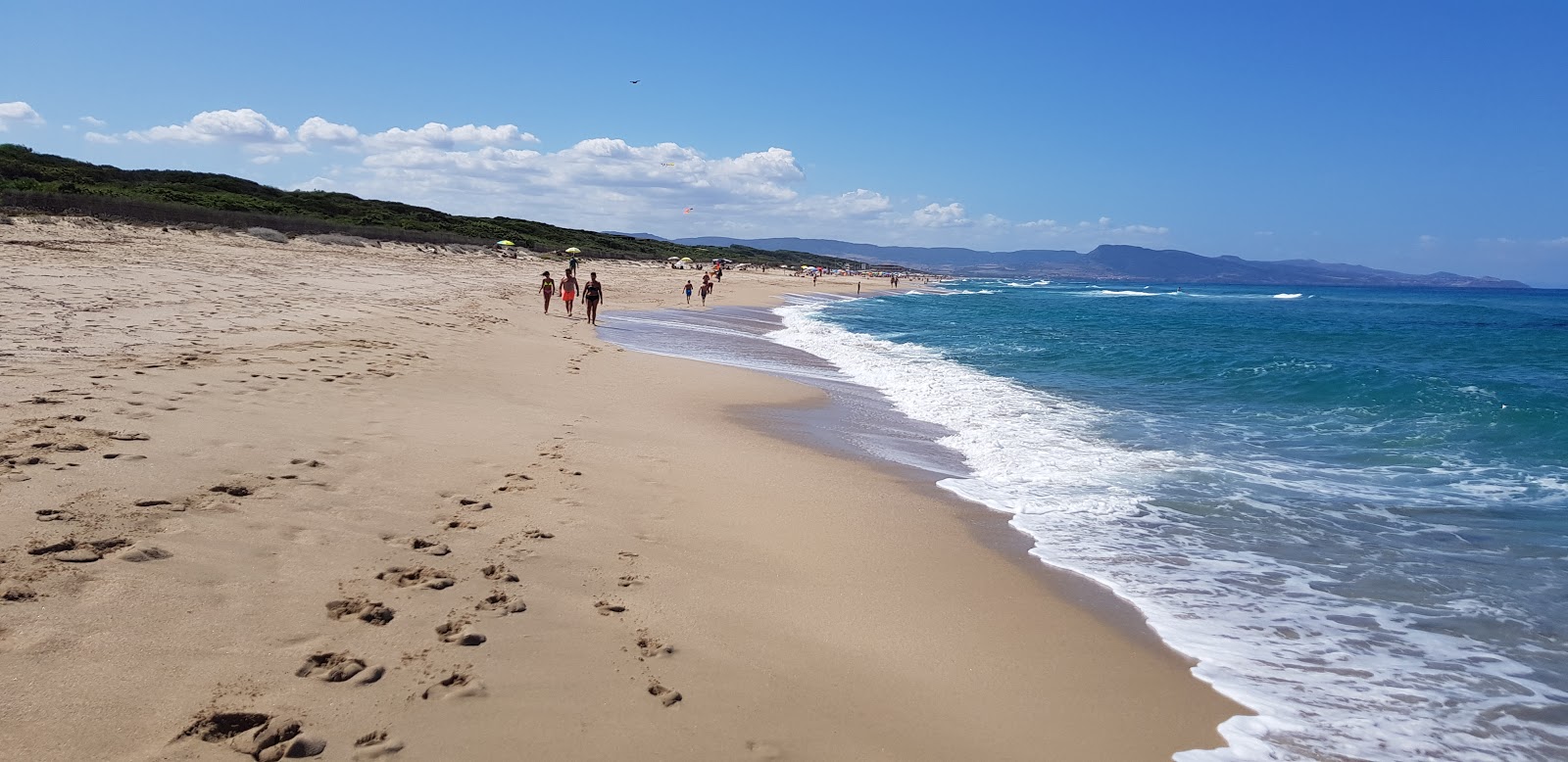 Foto di Spiaggia di Junchi di Badesi con molto pulito livello di pulizia