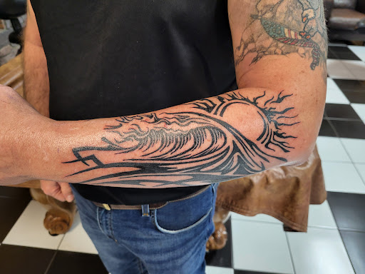 Explore simple one piece tattoo ideas, creative tattoo ideas in Dumfries, available at Iron Heart Tattoo Company