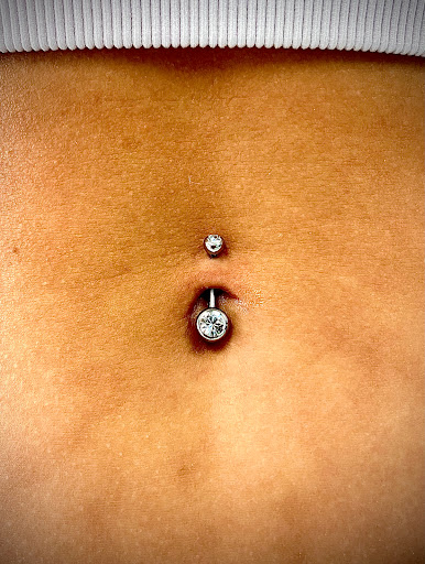 Explore bmth tattoo ideas, creative tattoo ideas in Orange, available at Symbiosis Body Piercing