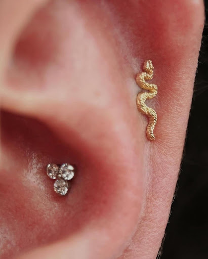 Explore thigh tattoo ideas men, creative tattoo ideas in Chicago, available at Identity Body Piercing