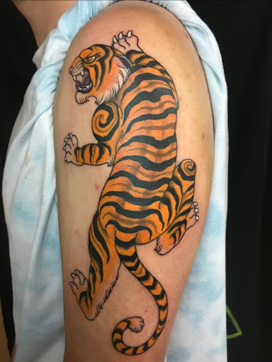 Explore upper sleeve tattoo ideas, creative tattoo ideas in Huntsville, available at Art-I-Facts Tattoo Gallery