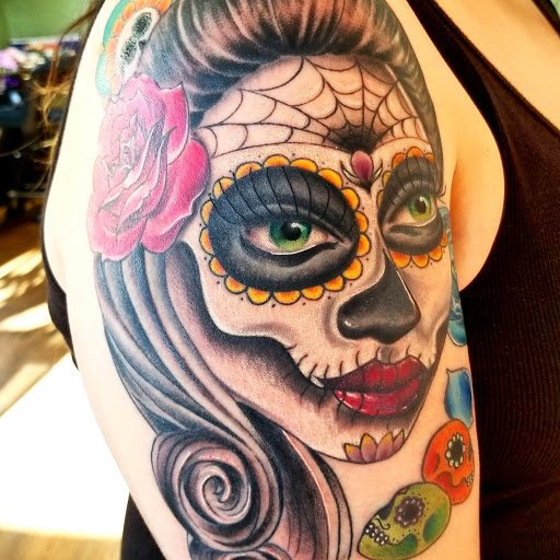 Explore cool guitar tattoo ideas, creative tattoo ideas in Santa Fe, available at Rivers Collective Body Art