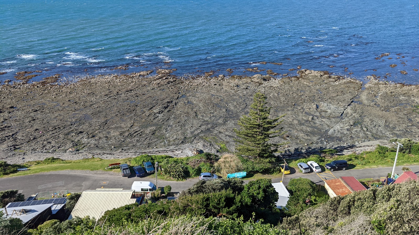 Foto de Pukerua Bay Beach e o assentamento