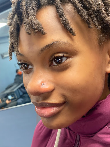 Explore ideas for hand tattoos, creative tattoo ideas in Springfield, available at Body Piercing By Qui Qui