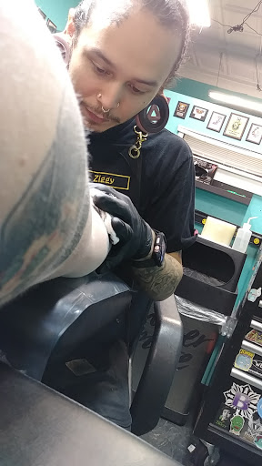Explore cover up tattoo ideas for men, creative tattoo ideas in Council Bluffs, available at Lil Bros Tattoo