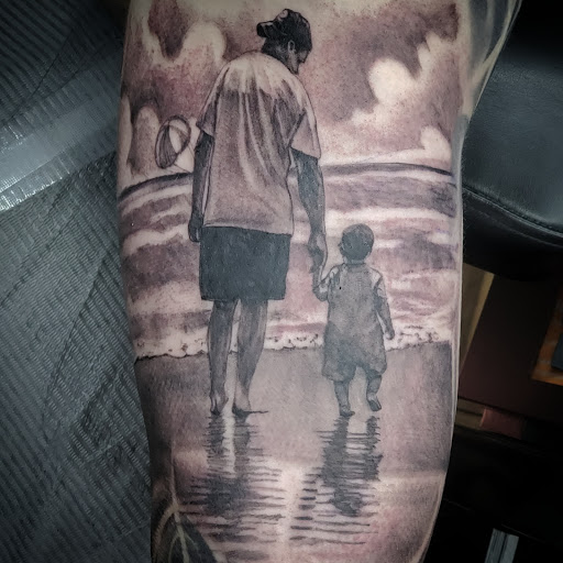 Explore baby tattoo ideas for dad, creative tattoo ideas in Langhorne, available at Artists of Blue Velvet Tattoo