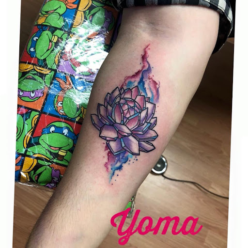 Explore dog bone tattoo ideas, creative tattoo ideas in San Antonio, available at Twisted Tattoo