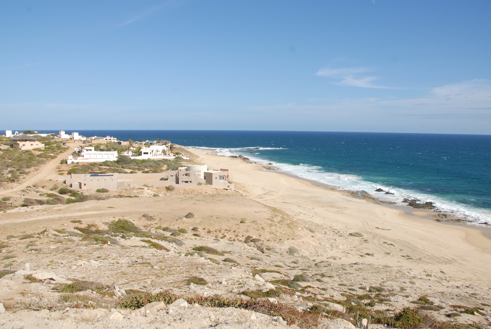 Foto di Playa Los Zacatitos con una superficie del sabbia fine e luminosa