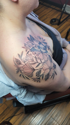 Explore foo fighters tattoo ideas, creative tattoo ideas in Green Bay, available at Skinny Buddha Tattoo