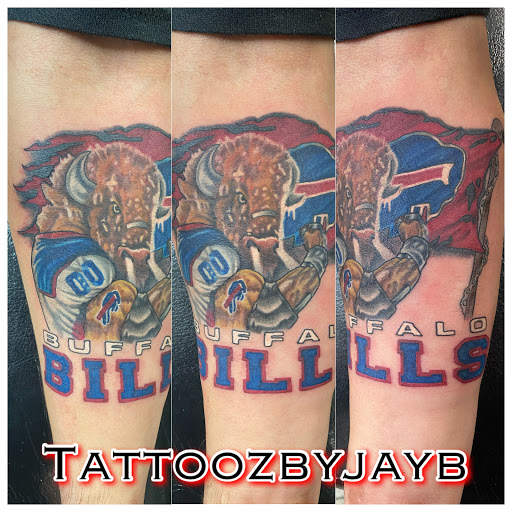Explore dragonfly flower tattoo ideas, creative tattoo ideas in Passaic, available at District 36 Tattoo Parlor