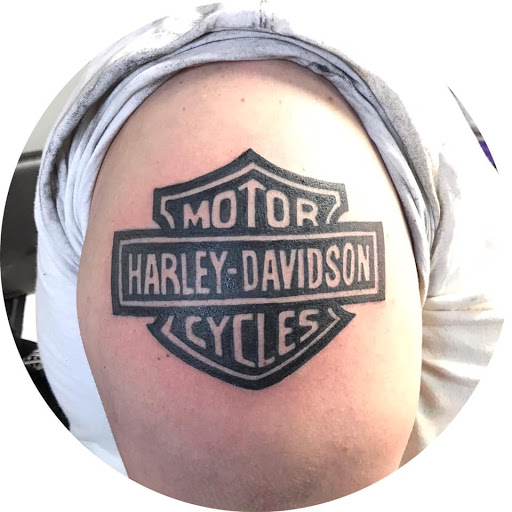 Explore chest plate tattoo ideas, creative tattoo ideas in Barberton, available at Magic City Tattoo Company