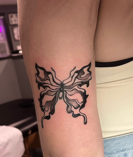 Explore mental health ribbon tattoo ideas, creative tattoo ideas in Charleston, available at The Edge Tattoo Studio