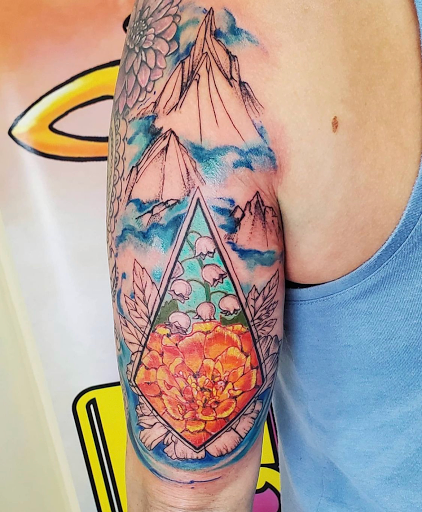 Explore women's arm sleeve tattoo ideas, creative tattoo ideas in Kenosha, available at Kenosha Tattoo Company