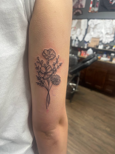 Explore men's back shoulder tattoo ideas, creative tattoo ideas in Dallas, available at Legacy Arts Tattoo 2