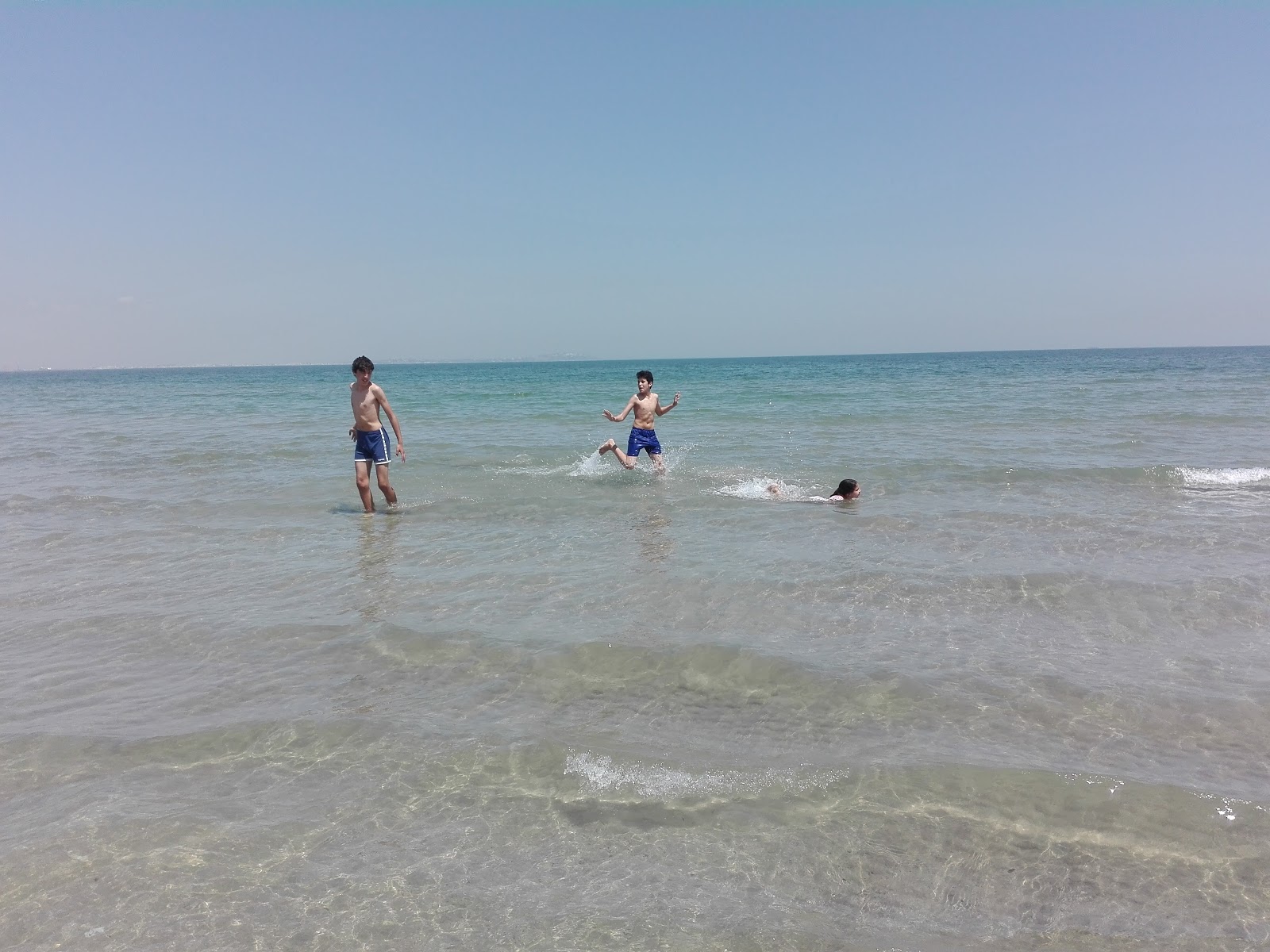Fotografie cu Beach Hammam chatt cu drept și lung