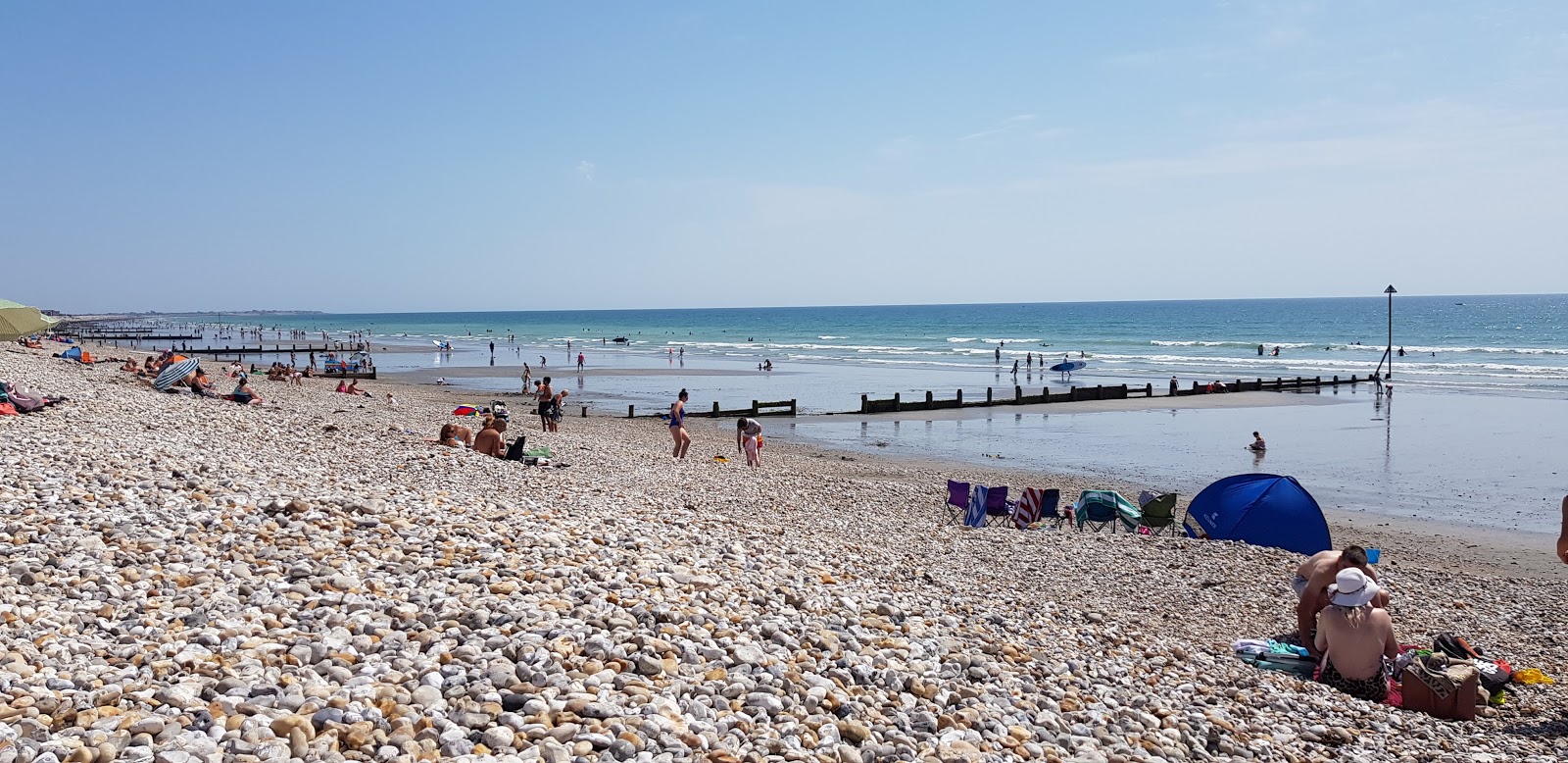 Photo of East Wittering beach with long straight shore
