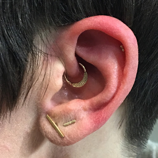 Explore raccoon tattoo ideas, creative tattoo ideas in Bloomington, available at Evil by the Needle Custom Tattoo and Piercing Studio