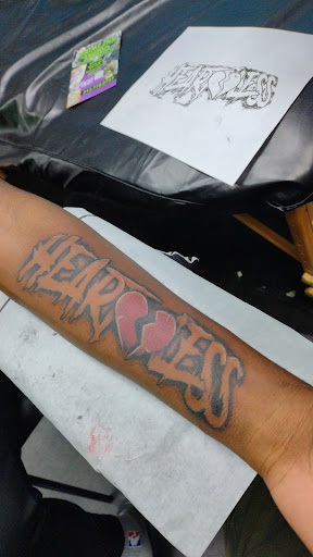 Find tattoo necklace ideas for your next unique tattoo in Redford at Prime Tattoo & Beauty