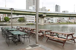 R RIVERSIDE GRILL & BEER GARDEN image