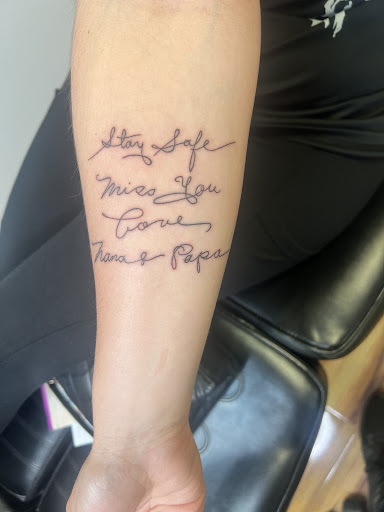 Explore 2 child tattoo ideas for dad, creative tattoo ideas in Mansfield, available at The Tattoo Jar